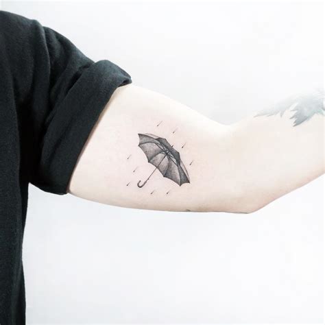 black umbrella tattoo and art gallery